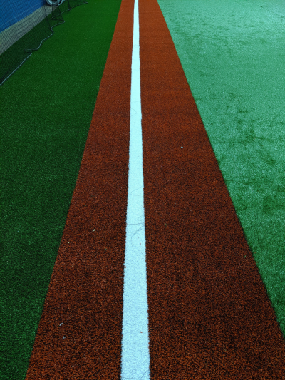 Inlaid Clay Turf Baselines in Indoor Baseball & Softball Facilities: The Pros & Cons